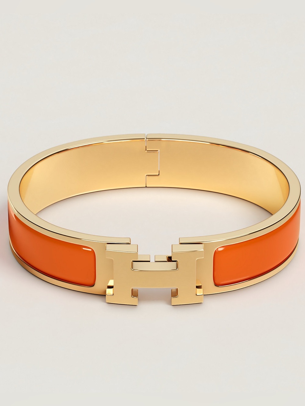 NWT Hermès Clic H Bracelet PM Orange & Gold